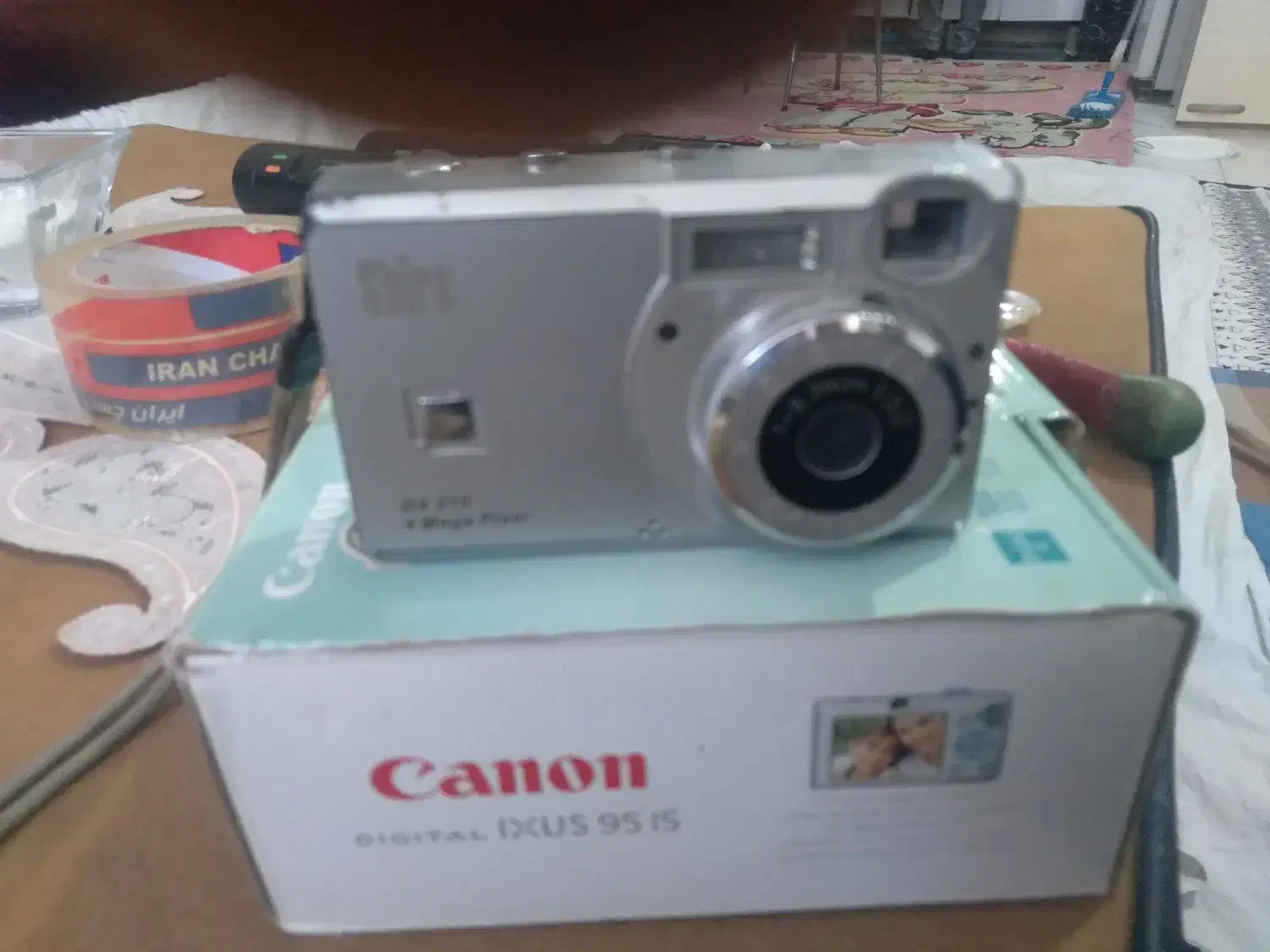 دوربین عکاسی و فیلمبرداری کانون|دوربین عکاسی و فیلم‌برداری|پرند, فاز ۶|دیوار