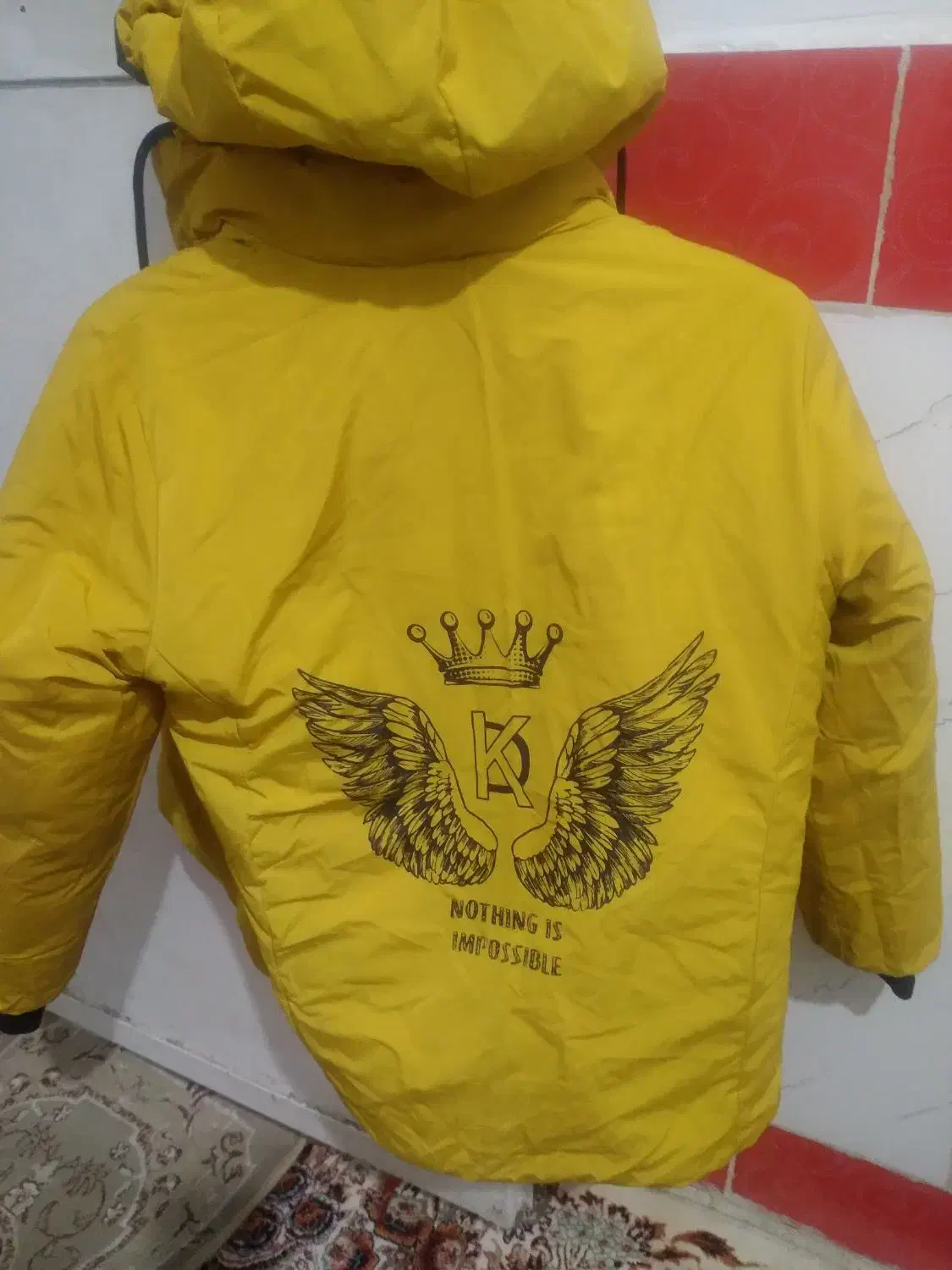 کاپشن|لباس|اندیمشک, |دیوار