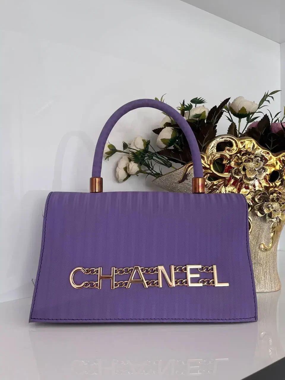 کیف|کیف، کفش، کمربند|نیشابور, بزرگمهر|دیوار