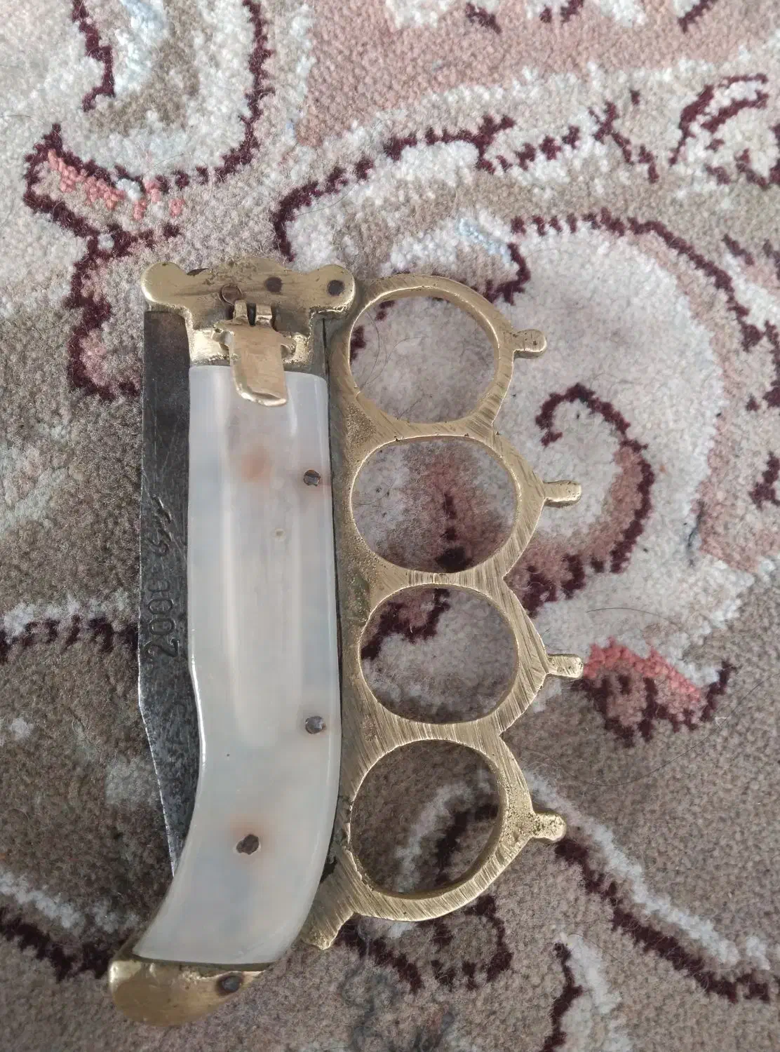 چاقو تاشو پنجه دار|کلکسیون اشیاء عتیقه|کوهدشت, |دیوار