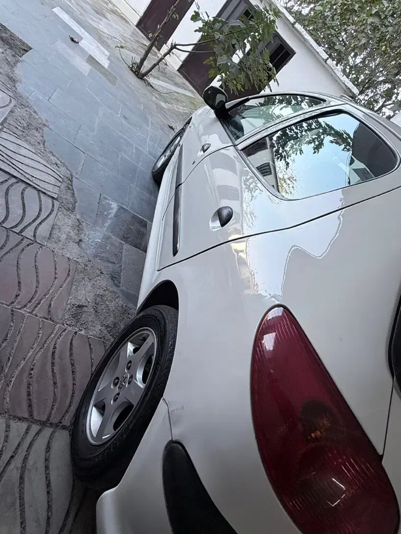 ۲۰۶ تیپ ۵ دریچه سیمی|خودرو سواری و وانت|پرهسر, |دیوار