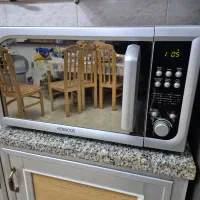 ماکروویو کنوود مدل(درب اینه ای)نونوسالم