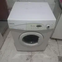 یک دستگاه ماشین لباسشویی مارک سامسونگ درحد صفر