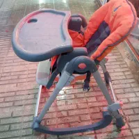 صندلی غذای کودک و یک عدد روروک