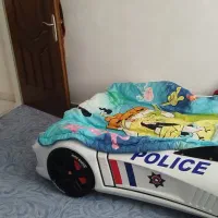 تخت و دراور و چراغ خواب مدل ماشین پلیس نوجوان