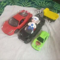 تعدادی اسباب بازی وعروسک وتاپ واسب