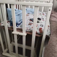 تخت کنار مادر گهواره ای