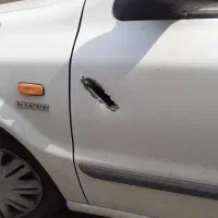در جلو و عقب سمند سفید سمت راننده