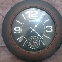 ساعت دیواری طرح چوب