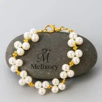 دستبند مرواریدی گل به گل