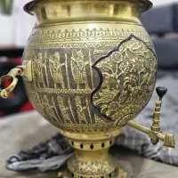 یک عدد سماور دست ساز قدیمی قلمکاری شده