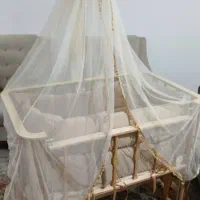 گهواره تخت کنار مادر