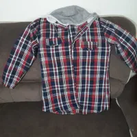 چند عدد لباس نو|لباس|رشت, دیانتی|دیوار