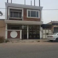 ساختمان دو طبقه در خیابان حلاجی