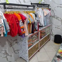 پوشاک بچه گانه|کفش و لباس بچه|شیراز, لب آب|دیوار