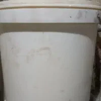 قوطی  شیر خشک و سطل ماست