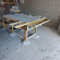 برشکار در انبار سنگ فروشی