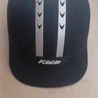کلاه و شلوار سوارکاری