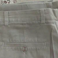 تعدادی شلوار و پیراهن و بلوز و کت شلوار