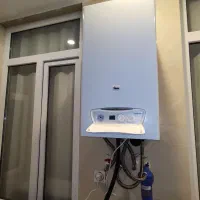 تعمیر فوق تخصصی انواع پکیج بوتان و ایران رادیاتور|خدمات پیشه و مهارت|کرج, چهارصد دستگاه|دیوار