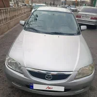 مزدا 323 نقره ای