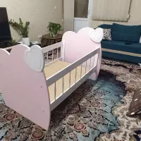 تخت خواب نوزاد و سه چرخه