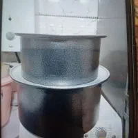 دوعدد دیگ بزرگ یکی برای ۴۰ نفر یکی برای ۶۰ نفر