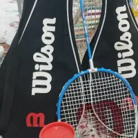 دوعدد راکت بدمینتون مدل ویلسون همراه با توپ