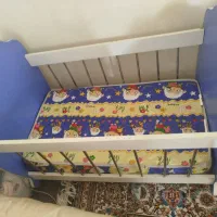 تخت گهواره ای نوزاد