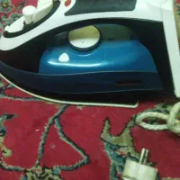 اتو لباس درحد نو