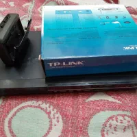 دستگاه dvd، مودم وای‌فای خط ثابت با واکمن قدیمی