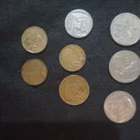 تعدادی سکه دلار یورو پژو مکزیک و ....