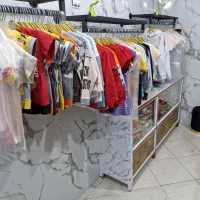 پوشاک بچه گانه|کفش و لباس بچه|شیراز, لب آب|دیوار