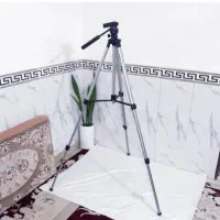 سه پایه دوربین و نورپردازی رینگ لایت طبق توضیحات|دوربین عکاسی و فیلم‌برداری|نسیم‌شهر, |دیوار