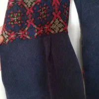 لباس سنتی بلند کار دست هنرمند ایرانی
