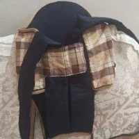 آغوشی و پشه بند نوزاد