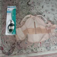 یک عددکمربند و قوزبند طبی فنردار نو