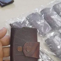 کیف جاکلیدی چرمی دکمه‌ای نو