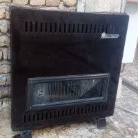 بخاری گازی آزمایش 7000 در حد نو با شیلنگ گاز و بست