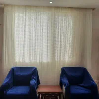 پرده تور نو همراه با چوب پرده و زیر پرده ای.