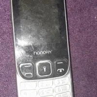 گوشی دکمه دار