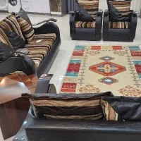 مبل راحتی و میز نهار خوری همراه با صندلی