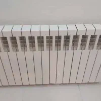 یک عدد رادیاتور سفید رنگ