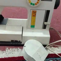 باسلام چرخ خیاطی تویوتا صنعتی ۱۳ کاره جادکمه ایی
