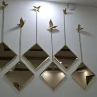 ساعت و اینه دکوارتیو و قاب پروانه