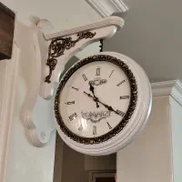 ساعت چرخشی دو بر دیواری