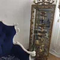 بوفه و مجسمه برنجی