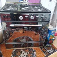 گاز  پنج شعله تمیز سالم و شعله های خوب دوتاهستن