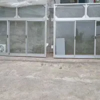 دو عدد پنجره آلمینیومی کشویی همراه با شیشه