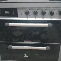 اجاق گاز پنج شعله بخاری و باند همه در حد نو